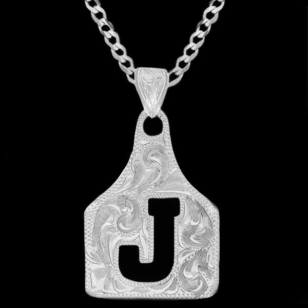  The Duke Cow Tag Necklace is crafted in a silver hand engraved base with your chosen initial, number or brand. Elevate any ensemble with this bespoke accessory. Pair it with a special discount sterling silver chain!